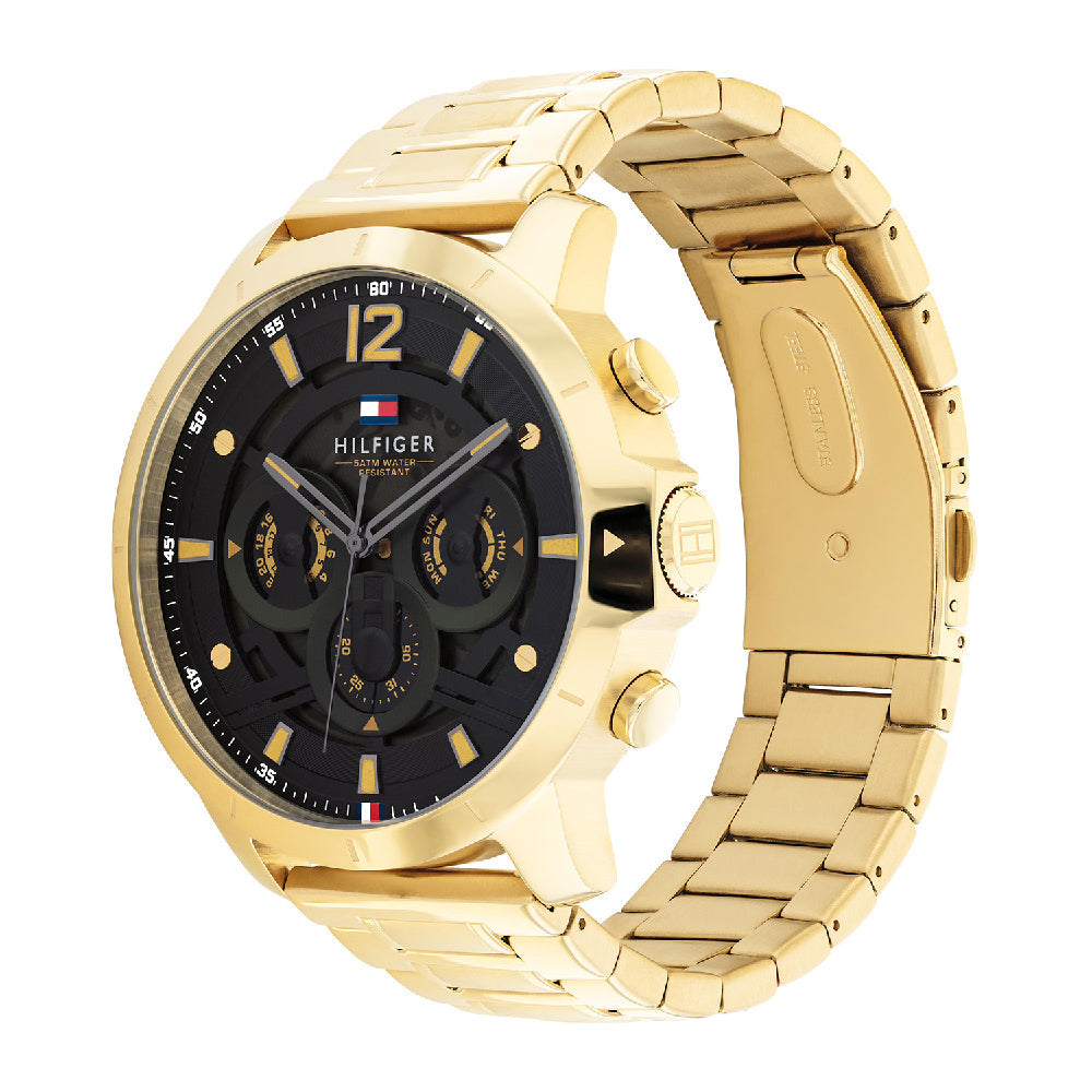 Tommy Hilfiger gold steel chronograph watch with black dial displayed at angle