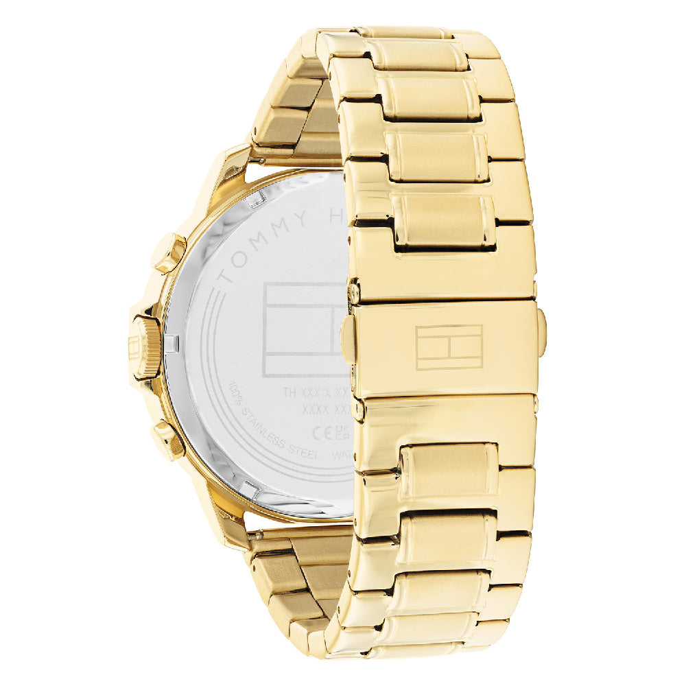 Case back of Tommy Hilfiger gold steel watch showing movement and engraving
