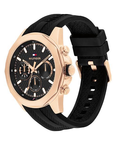 Tommy Hilfiger chronograph watch with rose gold case and black rubber strap side view