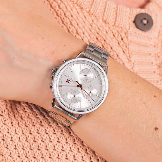 Tommy Hilfiger Sport Lux ladies chronograph watch on wrist with silver steel bracelet