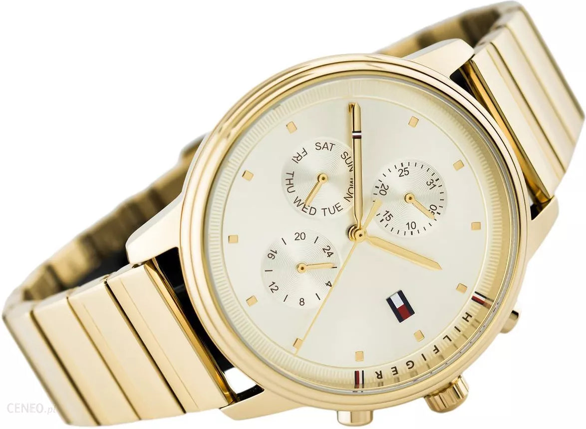 Tommy Hilfiger 1781905 gold ladies watch at angle showing dial, strap, and chronograph subdials