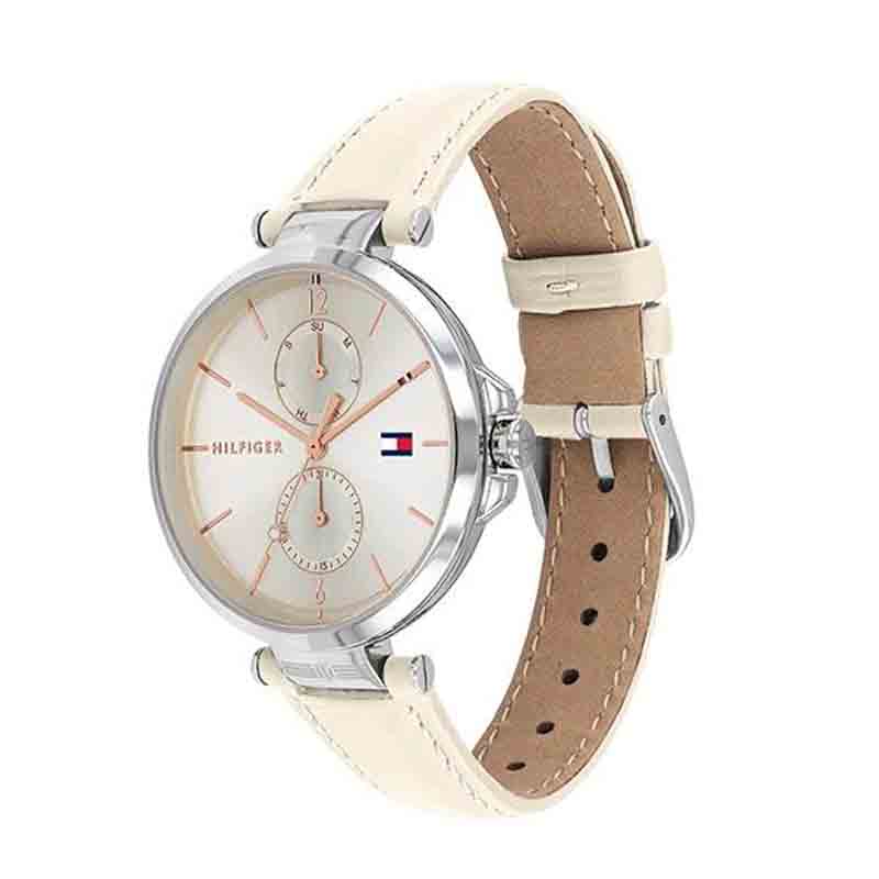 Tommy Hilfiger watch at angle showing cream leather strap with brown suede back