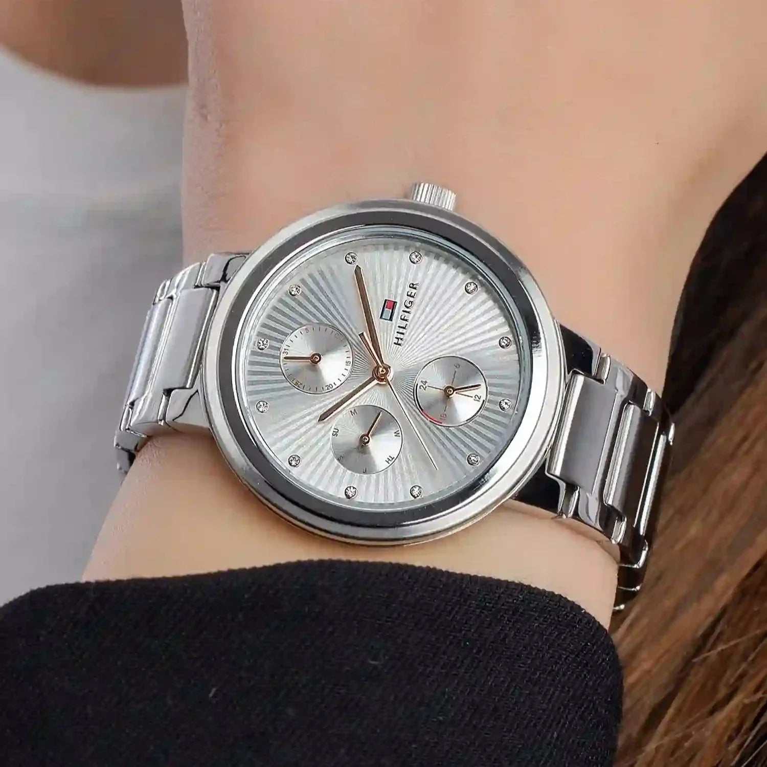 Tommy Hilfiger women's watch 1782532 worn on wrist showing silver case and bracelet