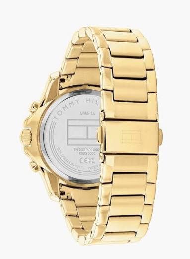 Back caseback view of gold-plated watch showing Tommy Hilfiger branding