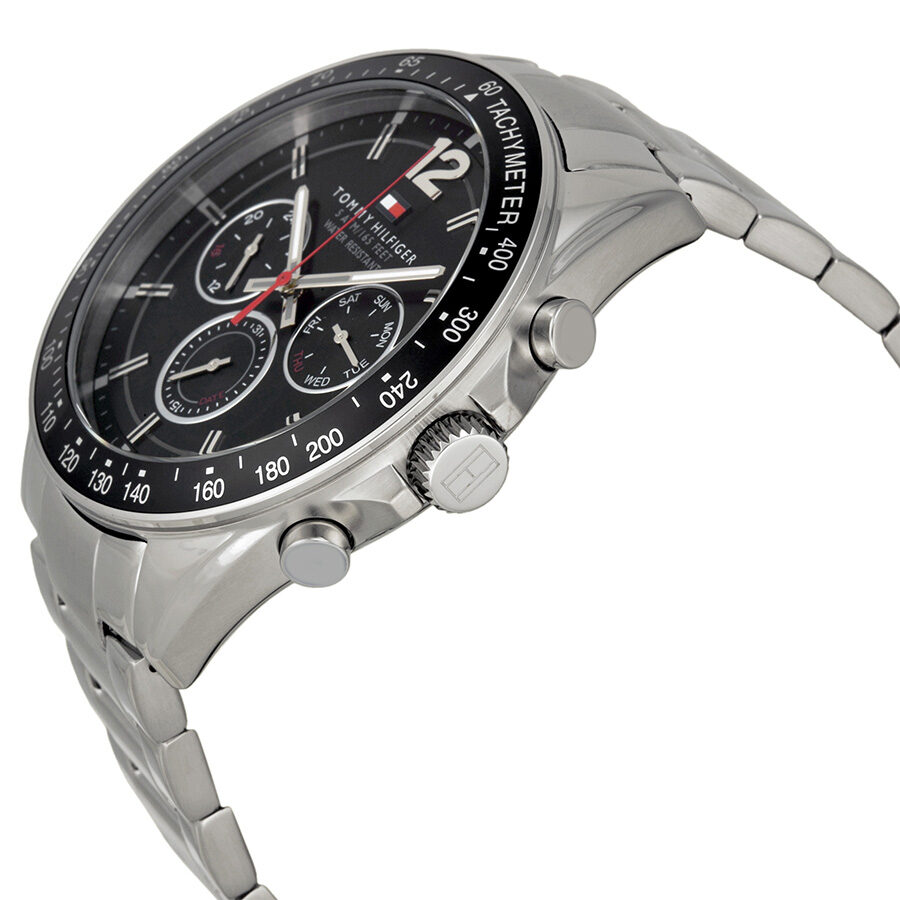 Tommy Hilfiger black dial chronograph watch at angle showing stainless steel bracelet and case