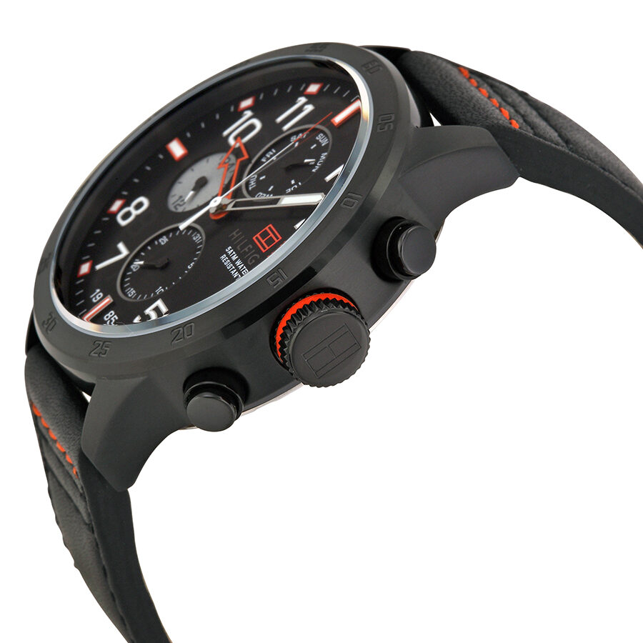 Side angle view of Tommy Hilfiger watch with orange-stitched black leather strap and crown detail