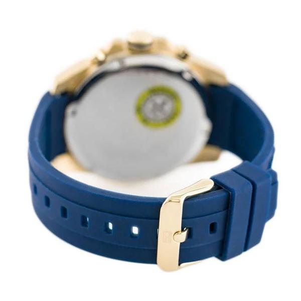 Caseback view of Tommy Hilfiger 48mm watch showing navy rubber strap and gold-tone lugs