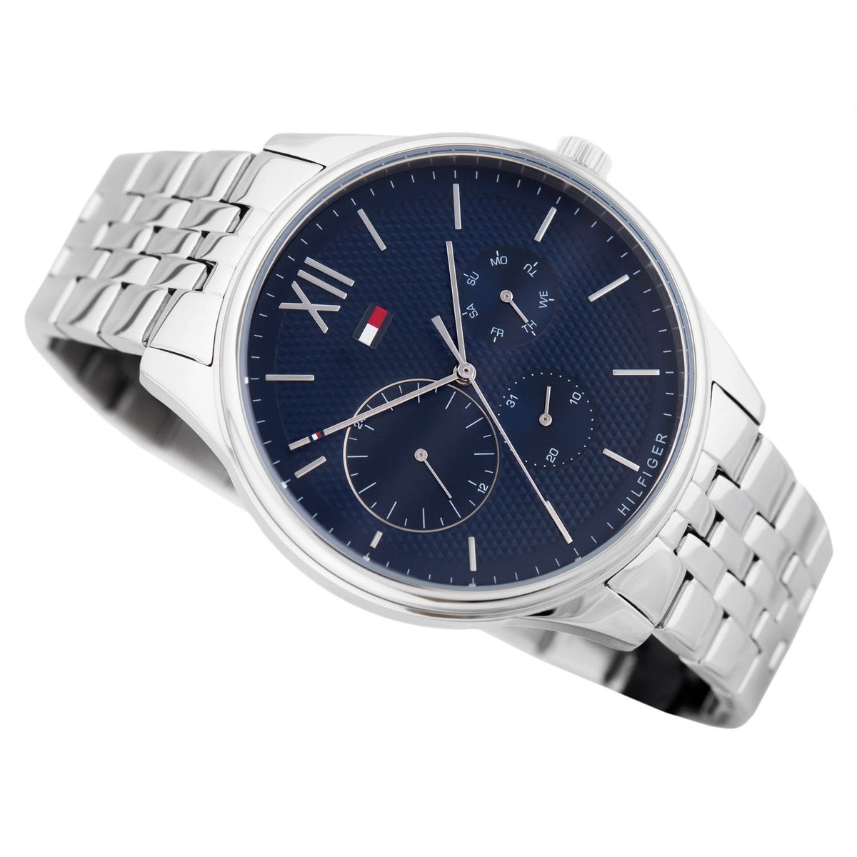 Detailed view of navy blue dial with Roman numerals and multiple subdials