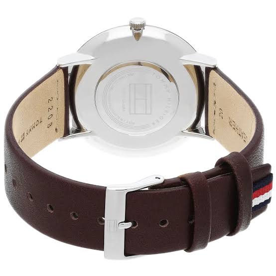 Tommy Hilfiger watch caseback showing brown leather strap and engraved case back