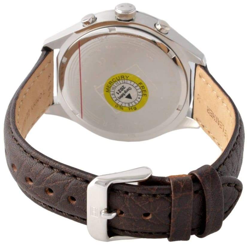 Caseback of Tommy Hilfiger watch showing movement and brown leather strap