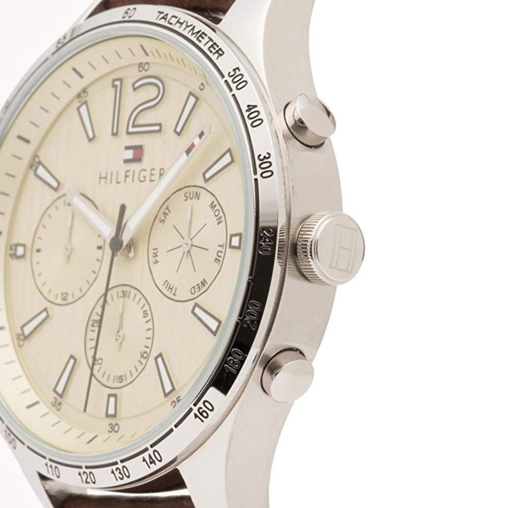 Side profile of Tommy Hilfiger watch showing pushers and tachymeter bezel detail