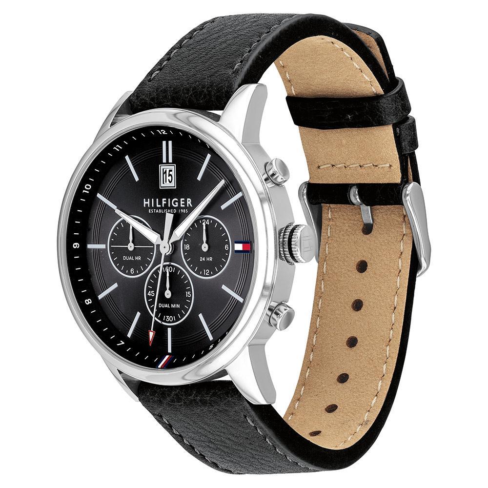 Tommy Hilfiger chronograph watch shown at angle displaying black leather strap with tan suede lining