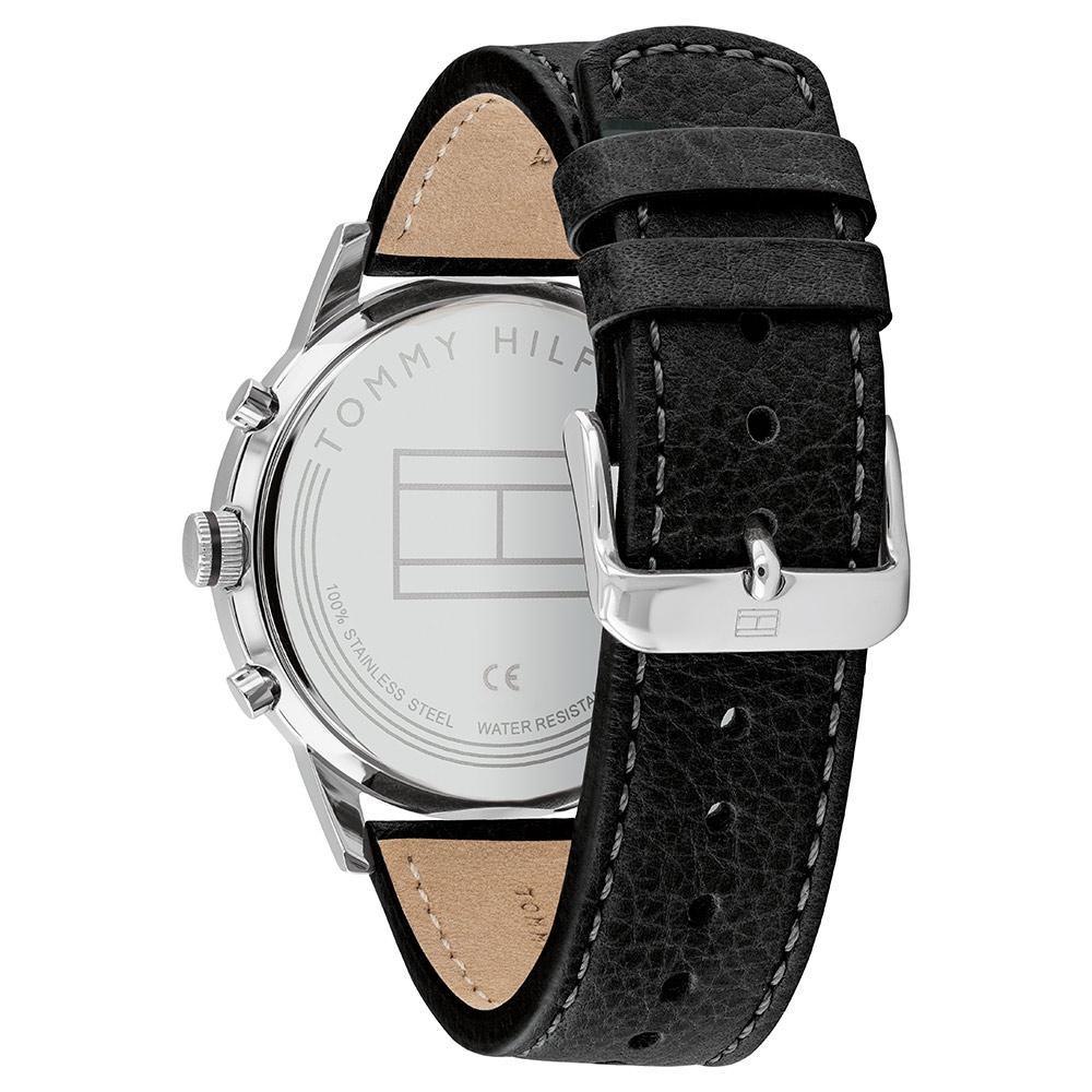 Case back of Tommy Hilfiger watch displaying serial engraving and water resistance rating