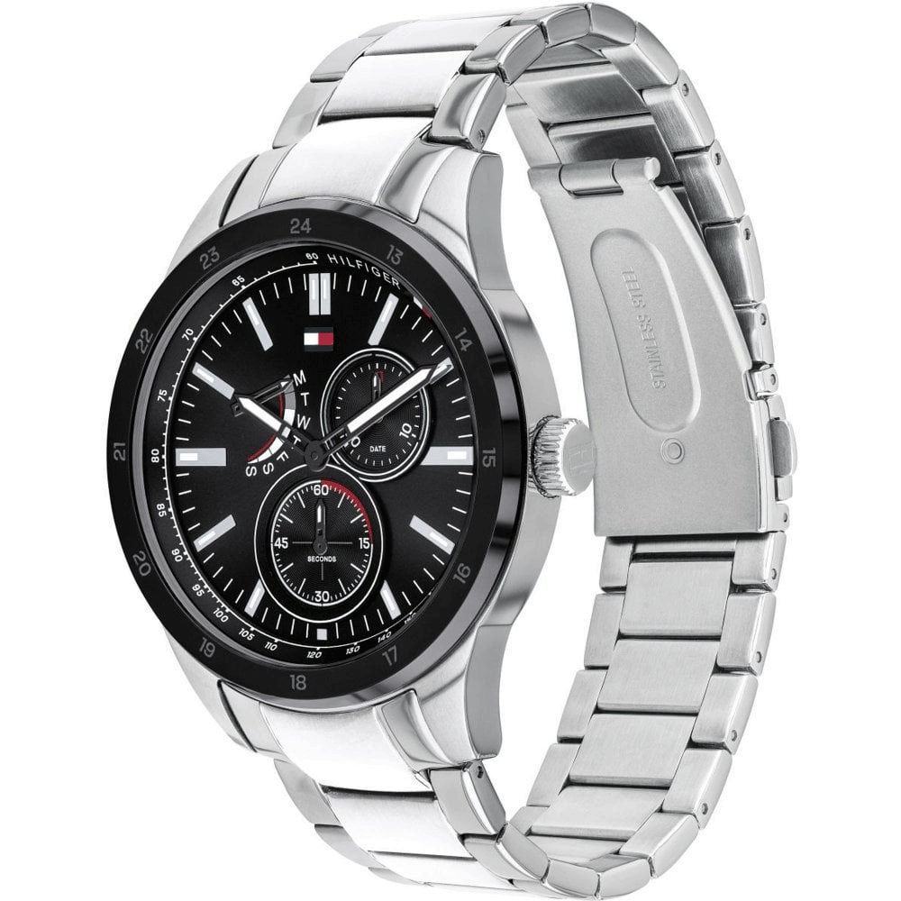 Angled view of Tommy Hilfiger watch showing dial and metal strap