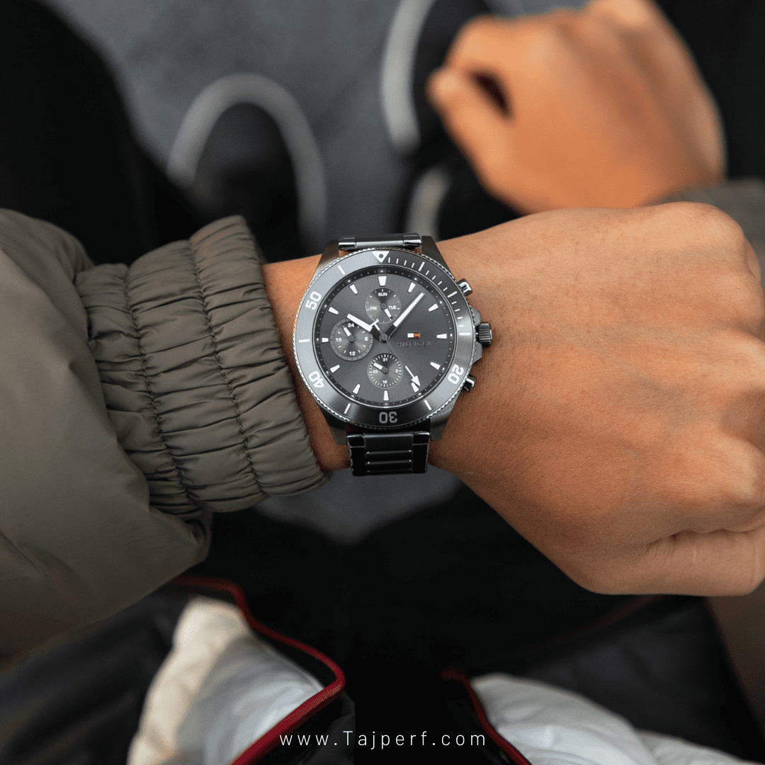 Tommy Hilfiger men's chronograph watch on wrist with stainless steel bracelet