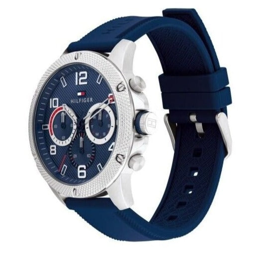 Three-quarter view of Tommy Hilfiger chronograph watch with multi-function blue dial and blue silicone strap