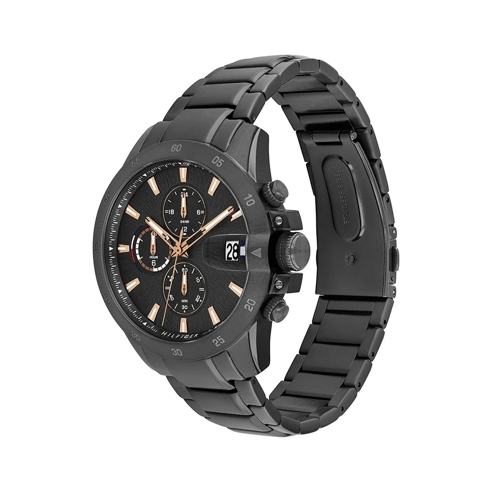 Tommy Hilfiger JAMESON watch displayed at angle showing dark grey metal bracelet and chronograph subdials
