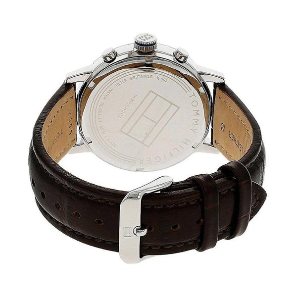 Caseback view of Tommy Hilfiger Alden watch showing brown leather strap and stainless steel case
