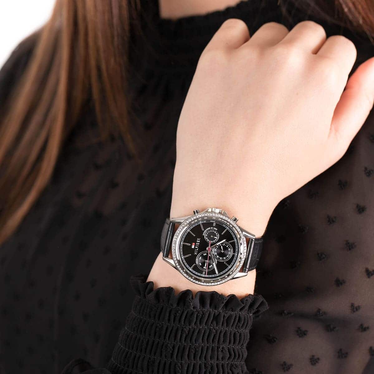 Tommy Hilfiger Ari Diamonds watch worn on wrist with black leather strap