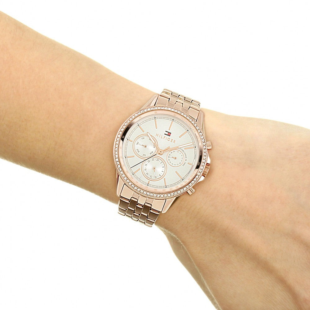 Tommy Hilfiger Ari rose gold chronograph watch worn on wrist with crystal-set bezel