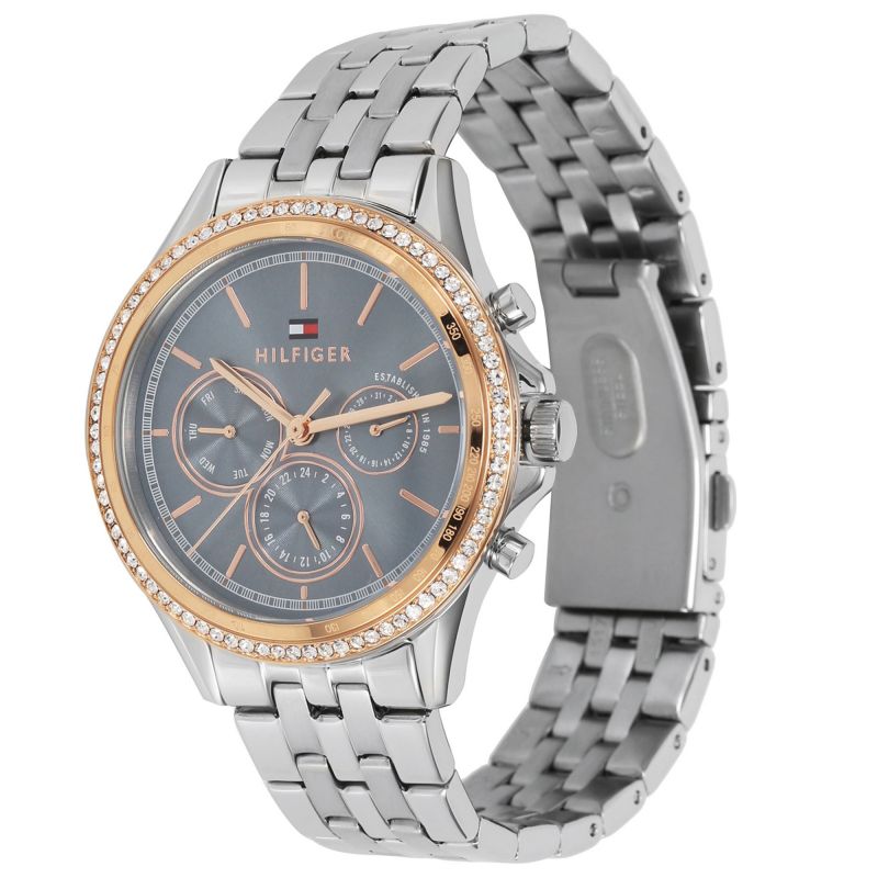 Side angle view of Tommy Hilfiger Ari watch showing steel bracelet and rose gold bezel detail
