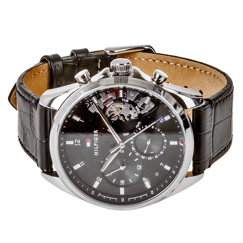 Side view of Tommy Hilfiger Baker watch showing tan leather interior and chronograph case thickness