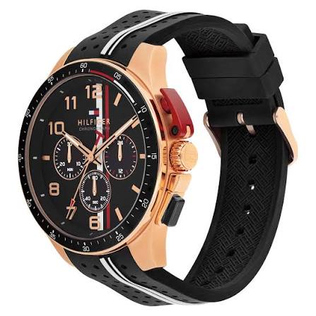 Side angle view of Tommy Hilfiger Bank chronograph watch with rose gold case and black rubber strap