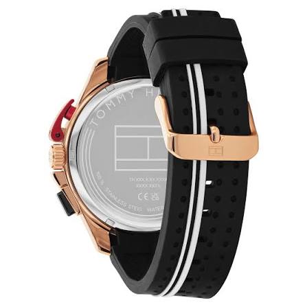 Caseback view of Tommy Hilfiger Bank watch showing transparent case with rose gold and black rubber strap