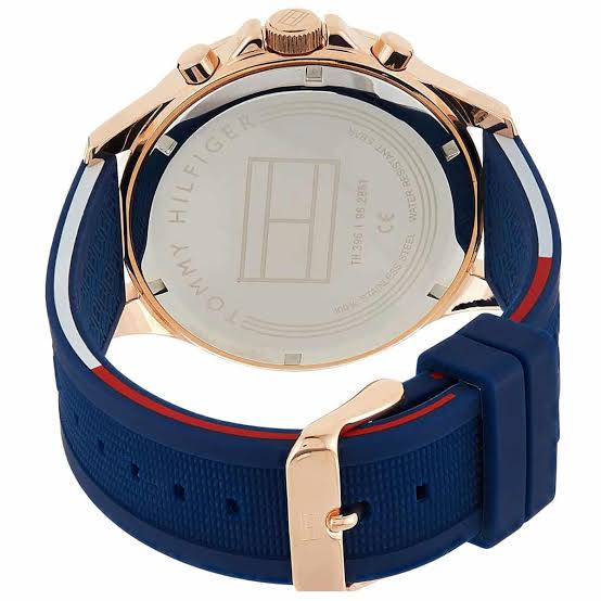 Tommy Hilfiger Bank watch caseback showing blue and red rubber strap with rose gold case
