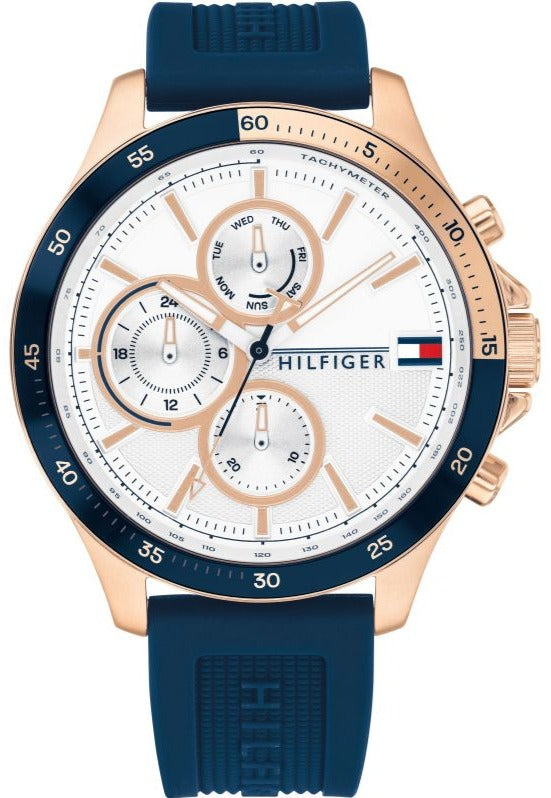 Tommy Hilfiger Bank men's chronograph watch with white dial, rose gold case, and blue rubber strap