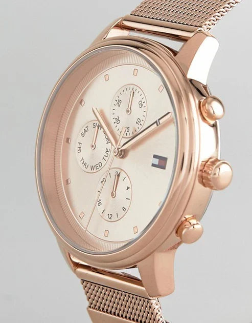 Side profile of Tommy Hilfiger Blake watch showing rose gold case thickness and mesh strap