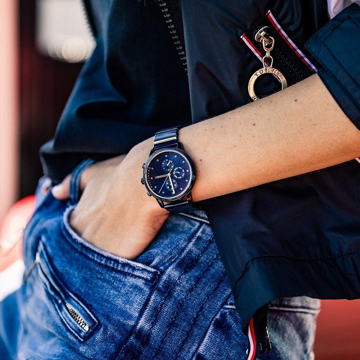 Tommy Hilfiger Blake chronograph watch worn on wrist with blue metal strap and blue dial