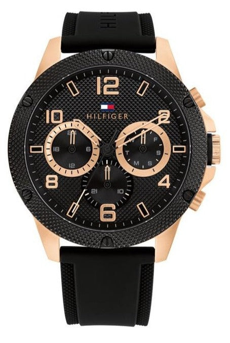 Tommy Hilfiger Blaze men's watch with black dial, rose gold case, and black rubber strap