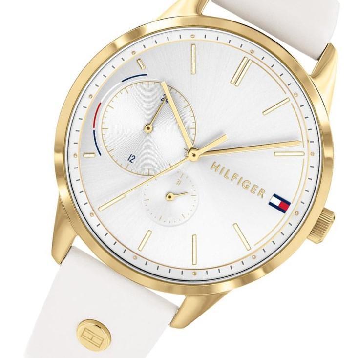 Close-up of Tommy Hilfiger Brooklyn watch dial showing gold hands, chronograph subdials, and Tommy Hilfiger branding