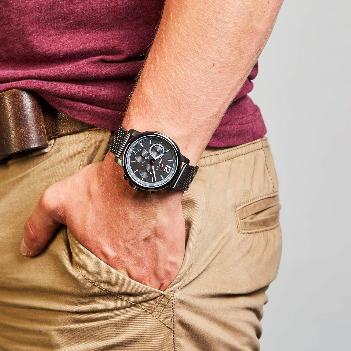 Tommy Hilfiger chronograph watch worn on wrist with black strap