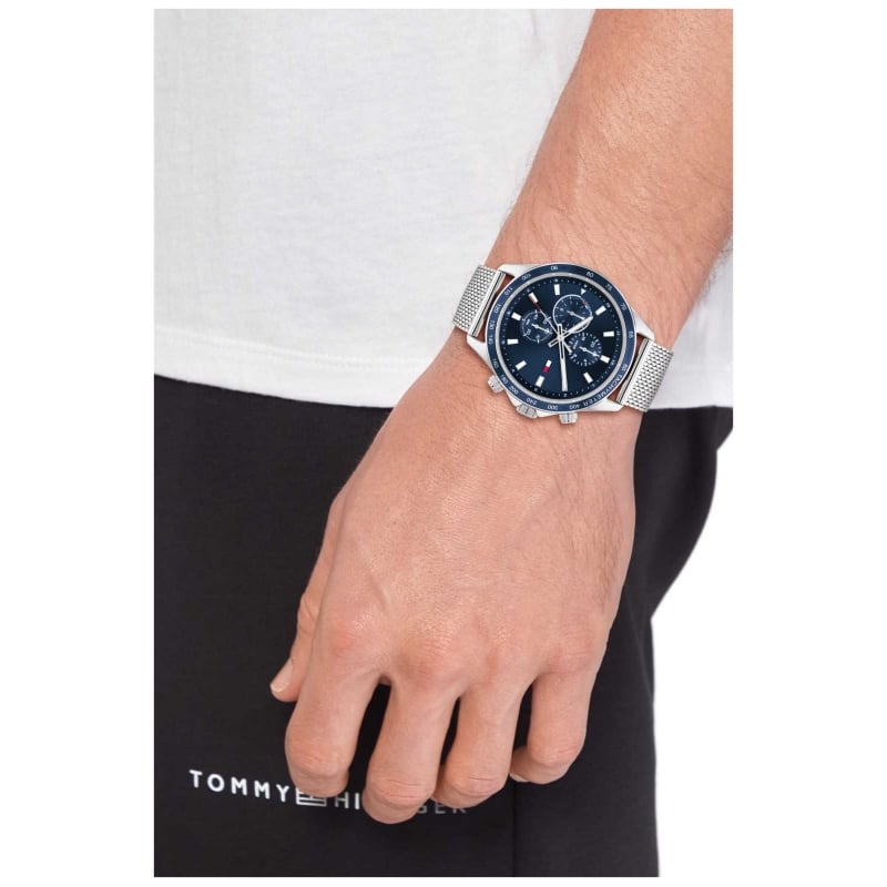 Man wearing Tommy Hilfiger Clark watch on wrist with silver steel bracelet