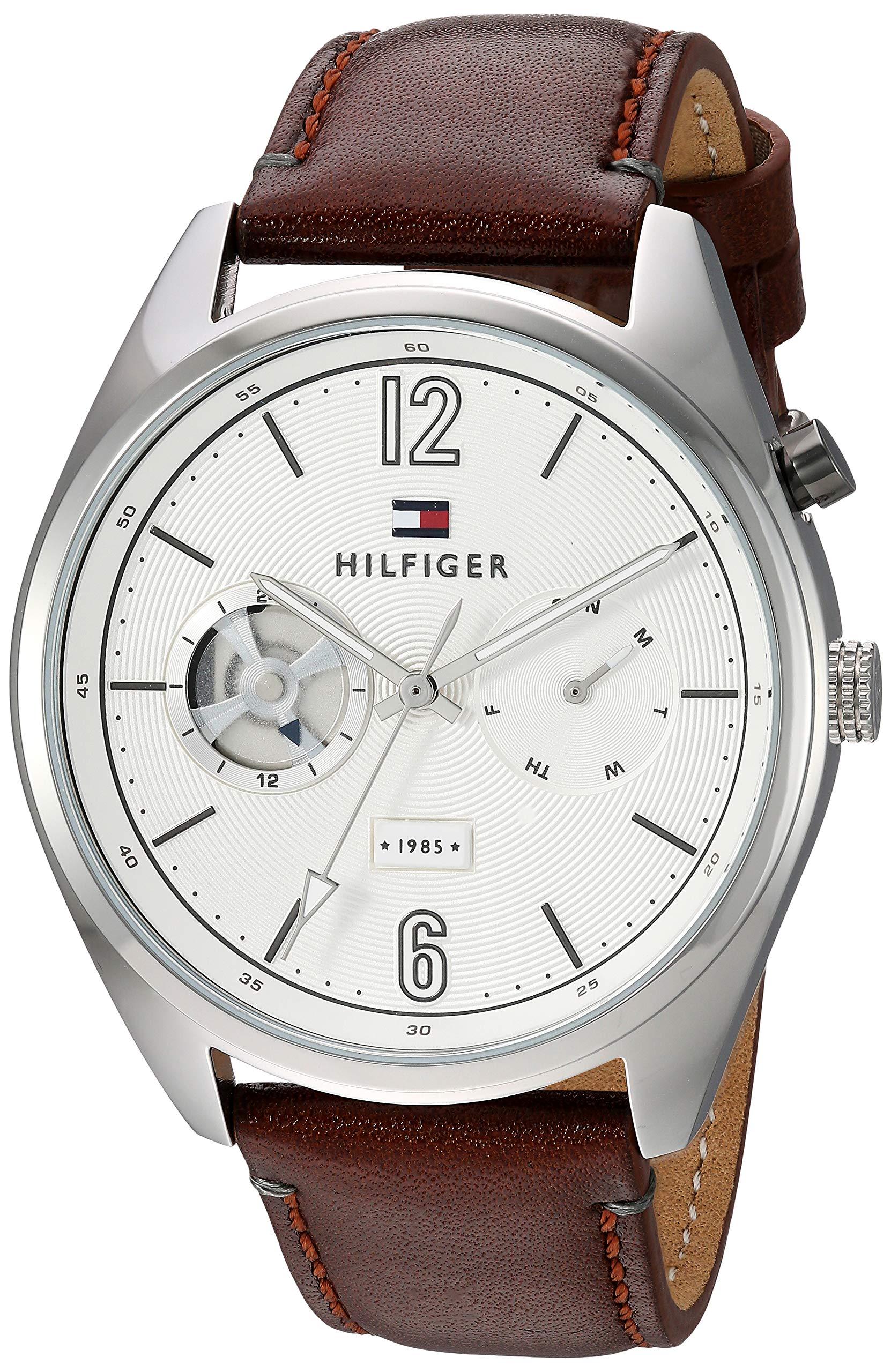 Tommy Hilfiger Deacon watch angled view showing silver case and brown leather strap