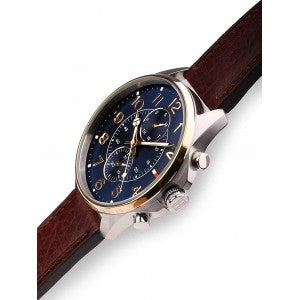 Side view of Tommy Hilfiger Dean watch with blue chronograph dial and brown leather strap