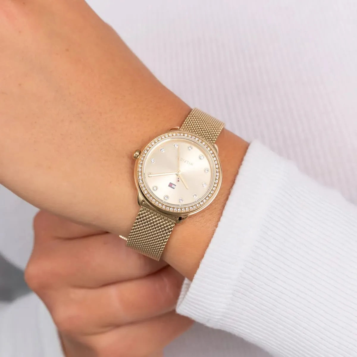 Tommy Hilfiger Demi watch on wrist with crystal bezel and gold dial visible