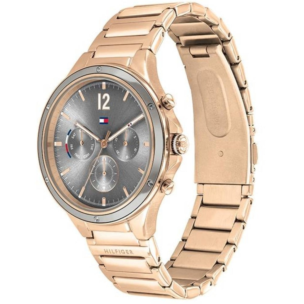 On-wrist view of rose gold-tone chronograph watch with metal bracelet and grey dial