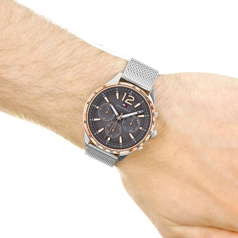 Tommy Hilfiger Gavin multifunction watch worn on wrist with mesh strap