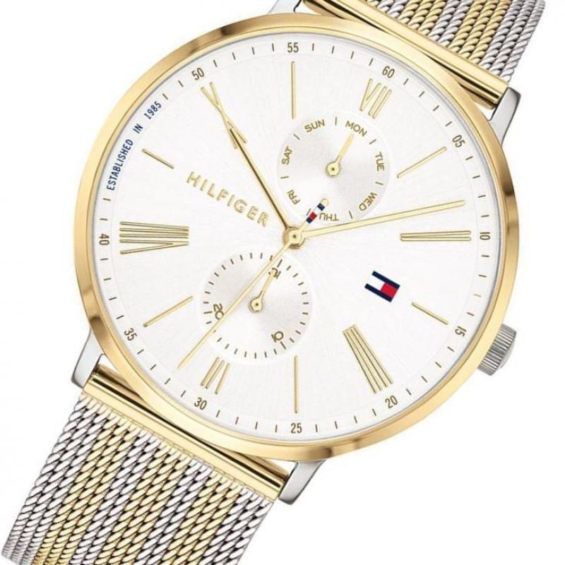 Tommy Hilfiger Jenna women's watch with white dial worn on wrist, two-tone design