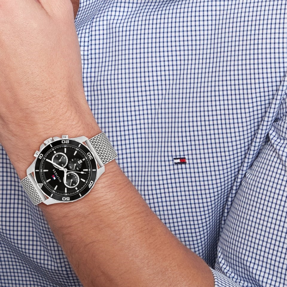 Tommy Hilfiger Jordan chronograph watch worn on wrist with black dial and mesh band