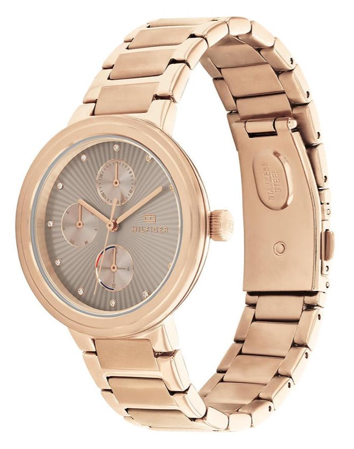 Side profile view of Tommy Hilfiger Joy watch showing gold steel strap and chronograph dial