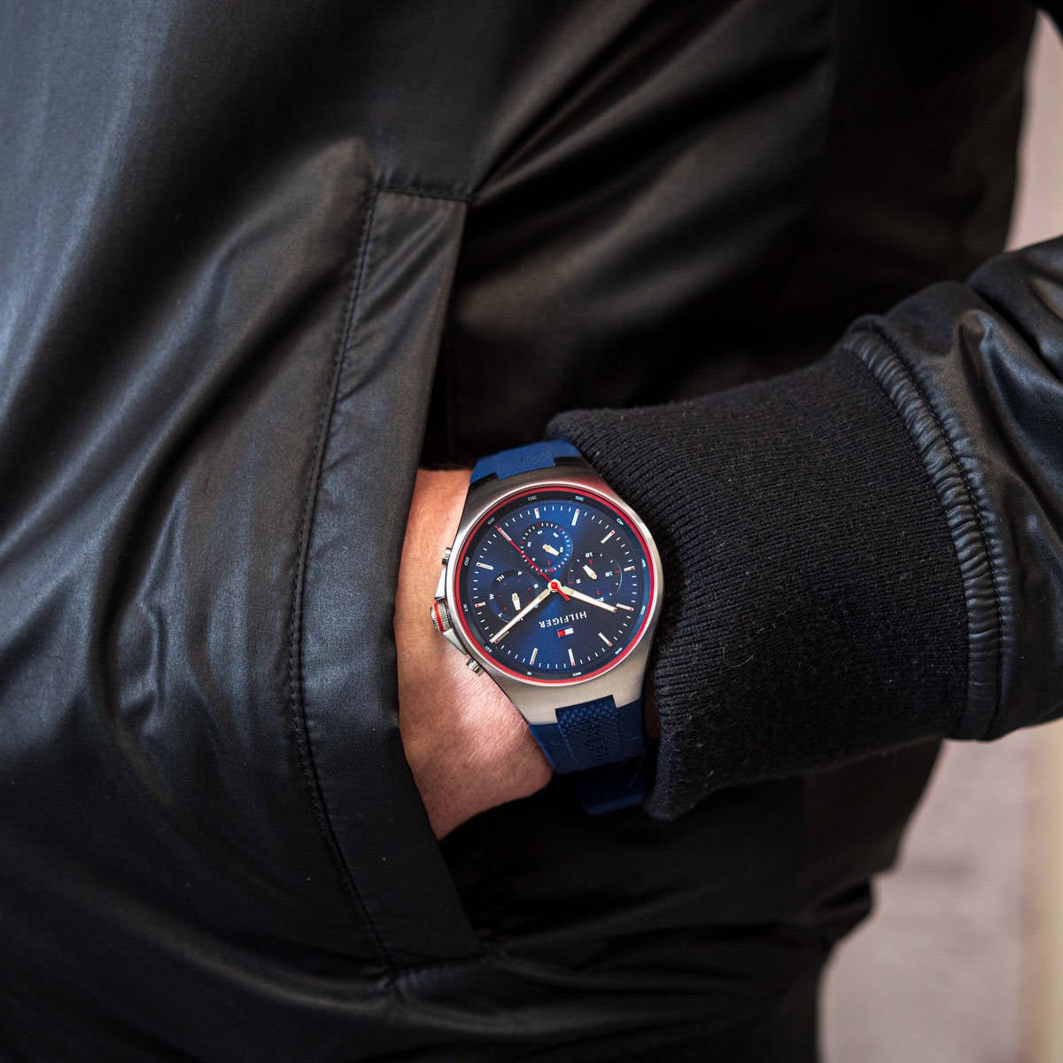 Tommy Hilfiger Justin chronograph watch on wrist showing navy dial and white case detail