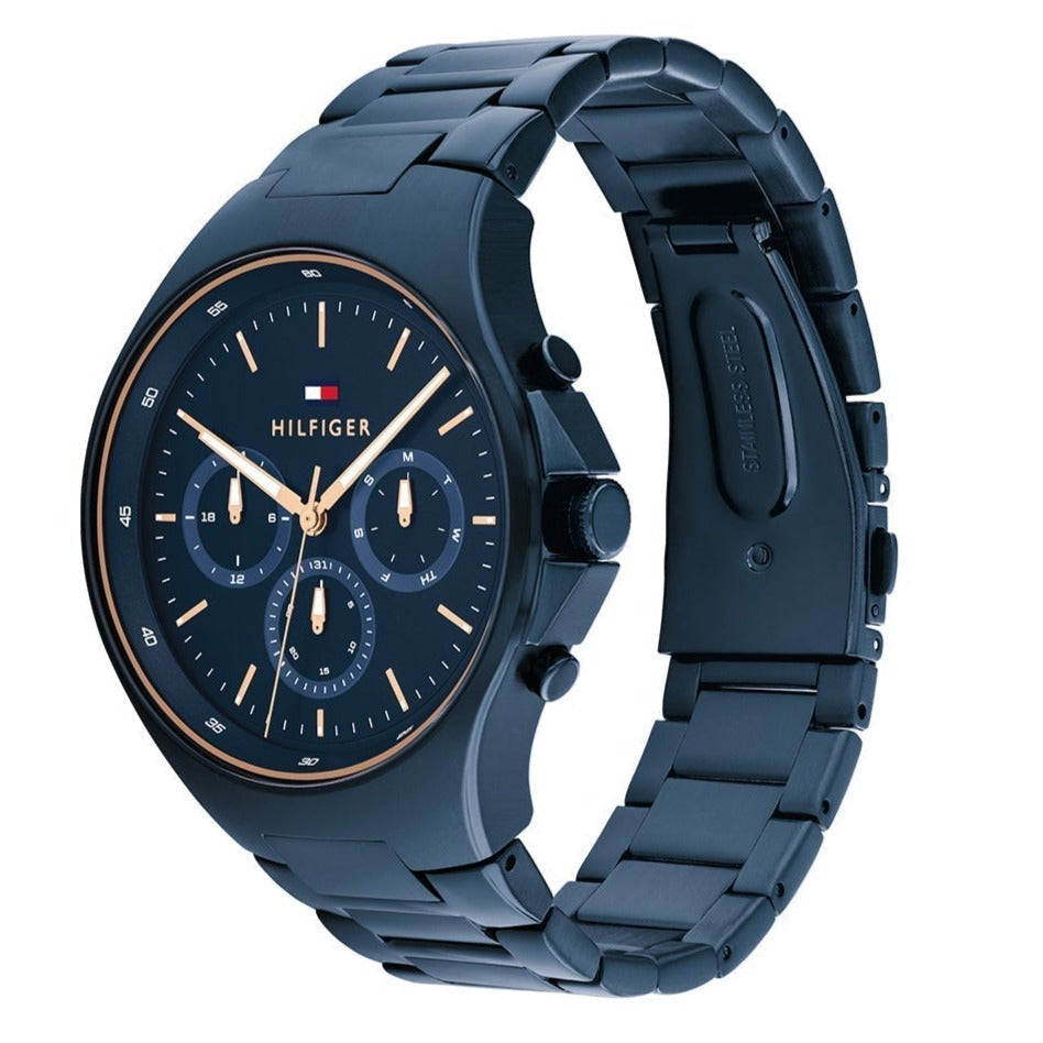 Tommy Hilfiger Justin blue chronograph watch shown at angle with steel bracelet visible