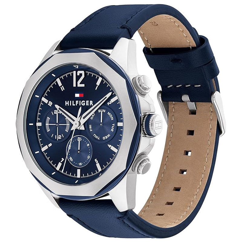 Tommy Hilfiger Lars watch side view showing silver case and navy leather strap with tan lining