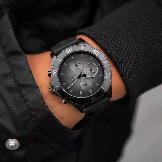Tommy Hilfiger Larson black chronograph watch worn on wrist with black strap
