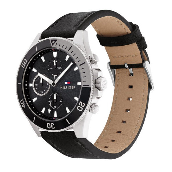 Tommy Hilfiger Larson multi-function watch worn on wrist with black leather strap
