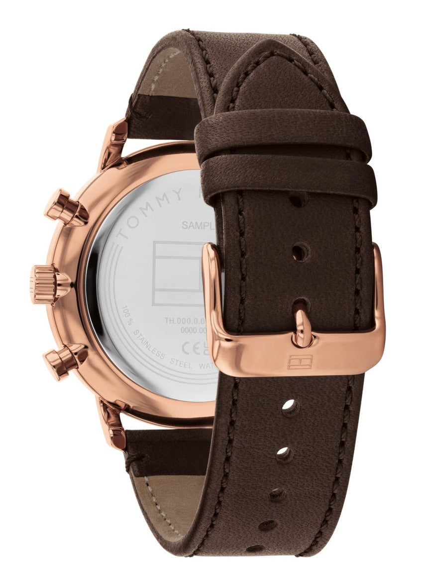 Tommy Hilfiger LEGEND caseback showing rose gold chronograph mechanism and brown leather strap